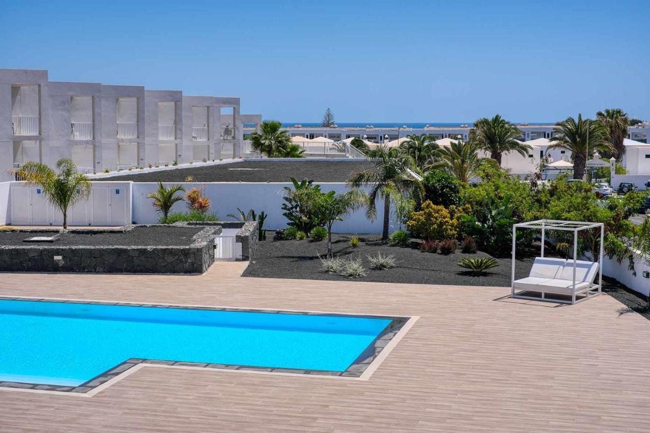 Luminosa vivienda vacacional con vista a la piscina Costa Teguise Exterior foto